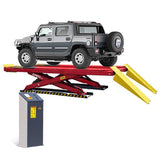A gray Hummer H2 is positioned on a red and yellow AMGO AX-16A Alignment Scissor Lift, with the platforms elevated to show the hydraulic lifting mechanism and control console.