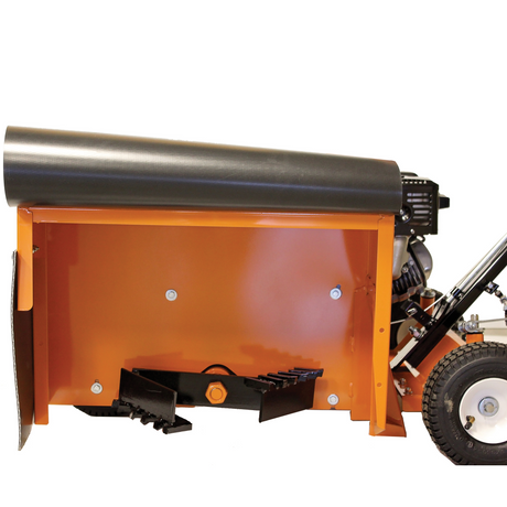 Close-up side view of the Brave 9-in. Steerable Trencher/Bed Sculptor, focusing on the 9-inch depth indicator and safety warnings on the product's orange housing.