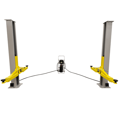 A front view of the Triumph C-7000 Portable Two-Post Car Lift showing both posts and the centrally located power unit. The yellow lift arms are shown in the lowered position.
