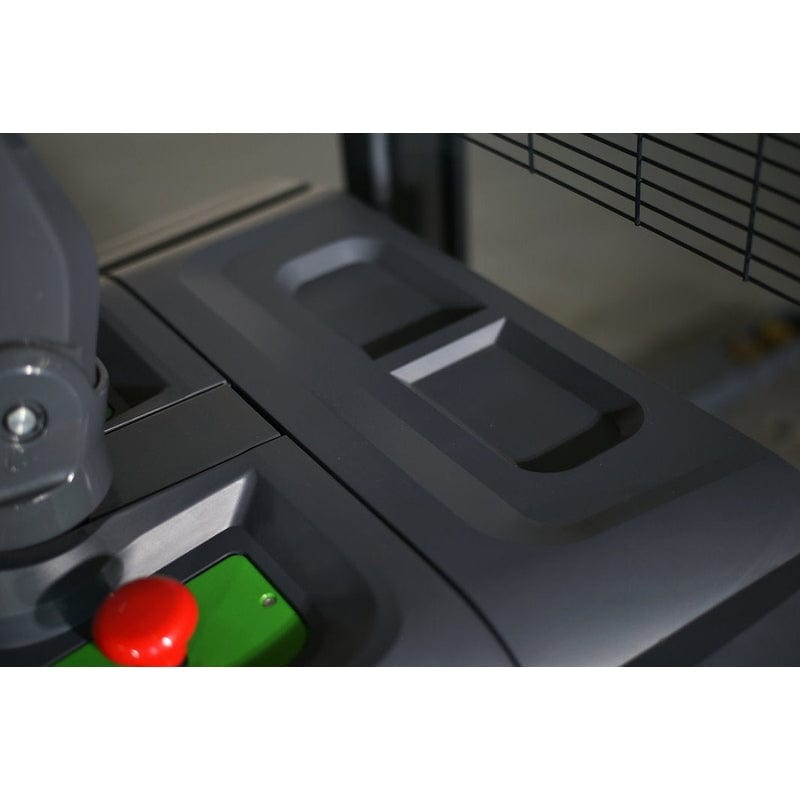 A close-up of the red emergency stop button and controls of the EKKO EB18C-118Li Electric Straddle Stacker.