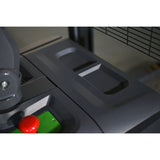A close-up of the red emergency stop button and controls of the EKKO EB18C-118Li Electric Straddle Stacker.