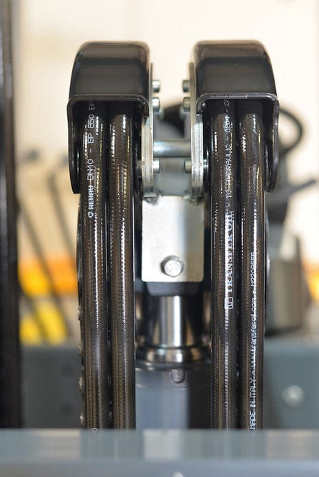 The two forks of the EKKO EK25-212LP Liquid Propane Forklift, designed for efficient load management.
