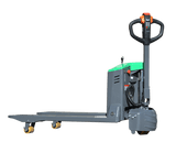 A side view of the gray and green EKKO EP18JLI Lithium Iron Phosphate electric walkie pallet jack against a checkered background, with its forks, handle, and wheels visible.