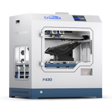 A front view of the CreatBot F430 3D printer, showing its fully enclosed chamber, dual extruders, and a large black object printed on the build platform.