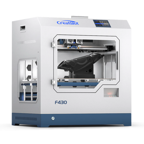 A front view of the CreatBot F430 3D printer, showing its fully enclosed chamber, dual extruders, and a large black object printed on the build platform.