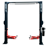 A detailed, full-body shot of the Katool Model: AS110D 2-post car lift on a blank background, featuring its black posts and red lifting arms. The image also shows a tire balancer attached to the side, highlighting the machine's multi-purpose functionality