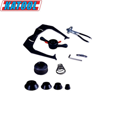 A close-up product view displays various black metal and plastic car repair tools and parts arranged on a white background, with a KATOOL logo in the top left corner.