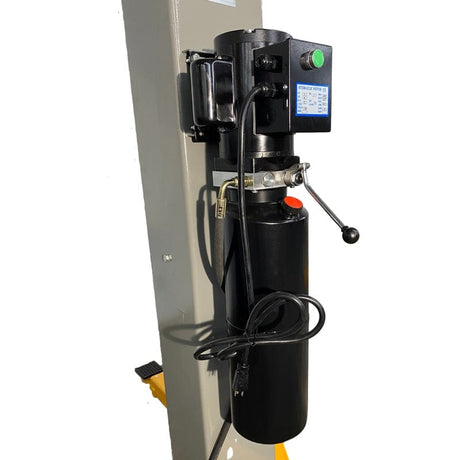 A close-up view of the hydraulic pump and 3 HP, 110V motor of the Triumph NT-9 two-post auto lift.
