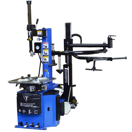 The Triumph NTC-950-1 tire changer, a large blue and black machine, is shown from a three-quarter view.