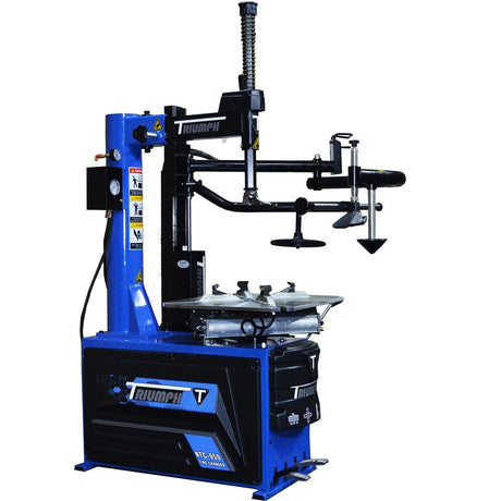 A close-up side view of the Triumph NTC-950-1 tire changer, focusing on its pneumatic controls and various features.
