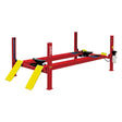 A red AMGO PRO-12ASX 4-Post Alignment Lift with yellow drive-on ramps against a white background, highlighting its skid-proof diamond plate runways.