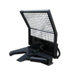 A black skid-steer tree shear with a protective mesh guard and a hydraulic cylinder, capable of shearing trees up to 12 inches in diameter.