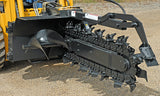 A black mini trencher with a chain saw-like blade attachment mounted on a skid-steer loader.